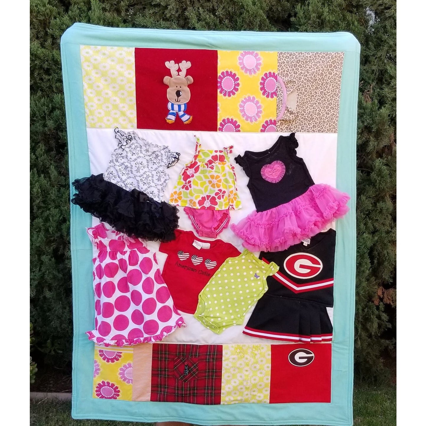 Handmade memory quilt from baby clothes