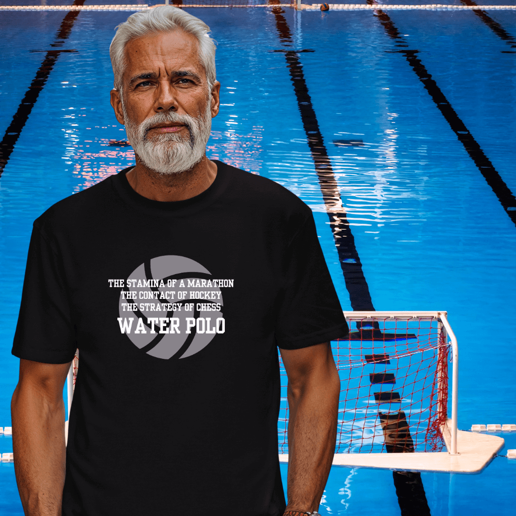 Man wearing a black t-shirt with water polo text by a pool